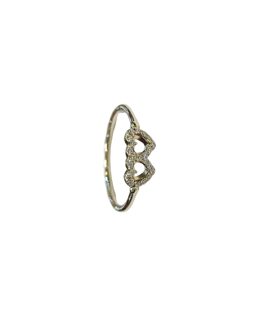 Detalle anillo juvenil dos corazones circones plata 925 engaste acabado